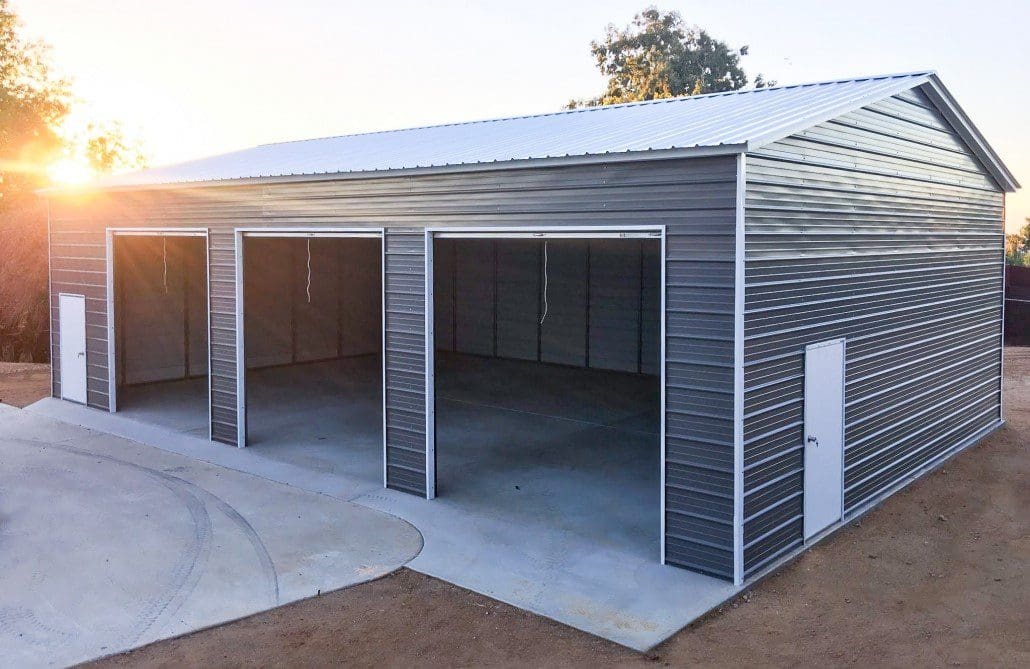 A large dark colored steel garage