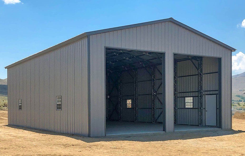 A large tall steel garage for two vehicles