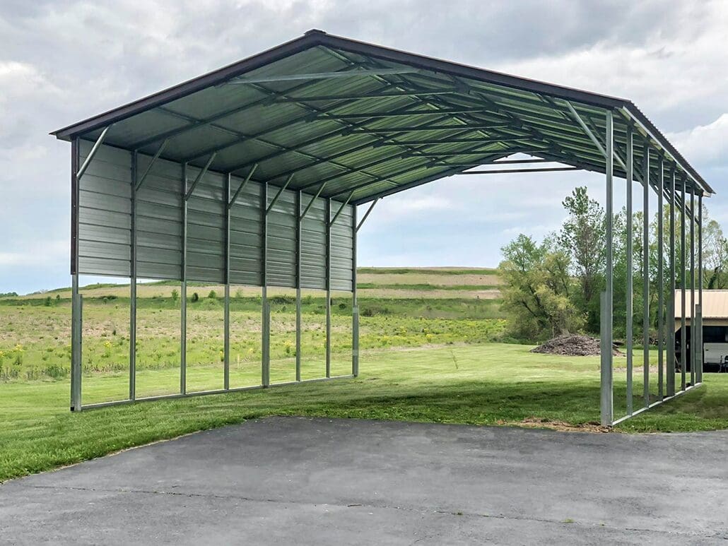 A tall carport on grass