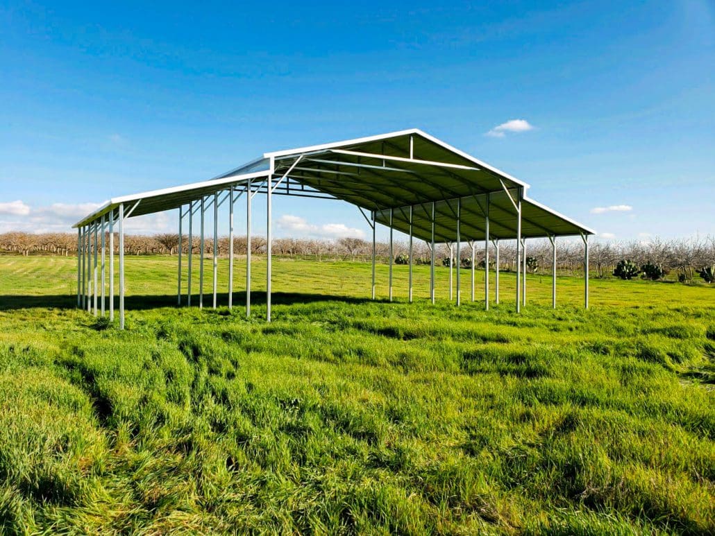 A wide steel carport for multiple vehicles