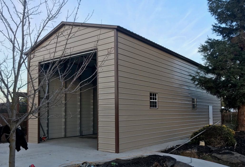 A tall brown steel garage